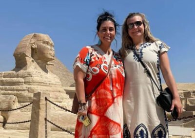 Two women in front of Sphinx