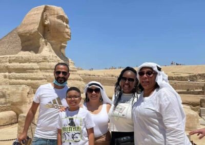 A family in front of Sphinx